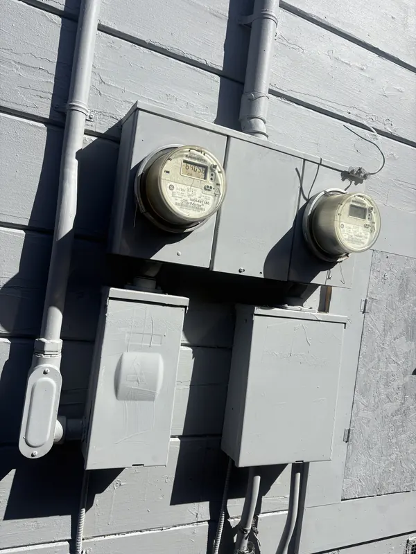 Original Federal Pacific equipment and meters on the San Mateo duplex before the upgrade