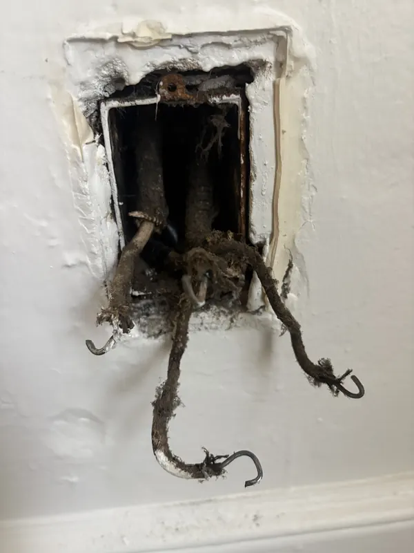 Old knob-and-tube era wiring found inside a wall box
